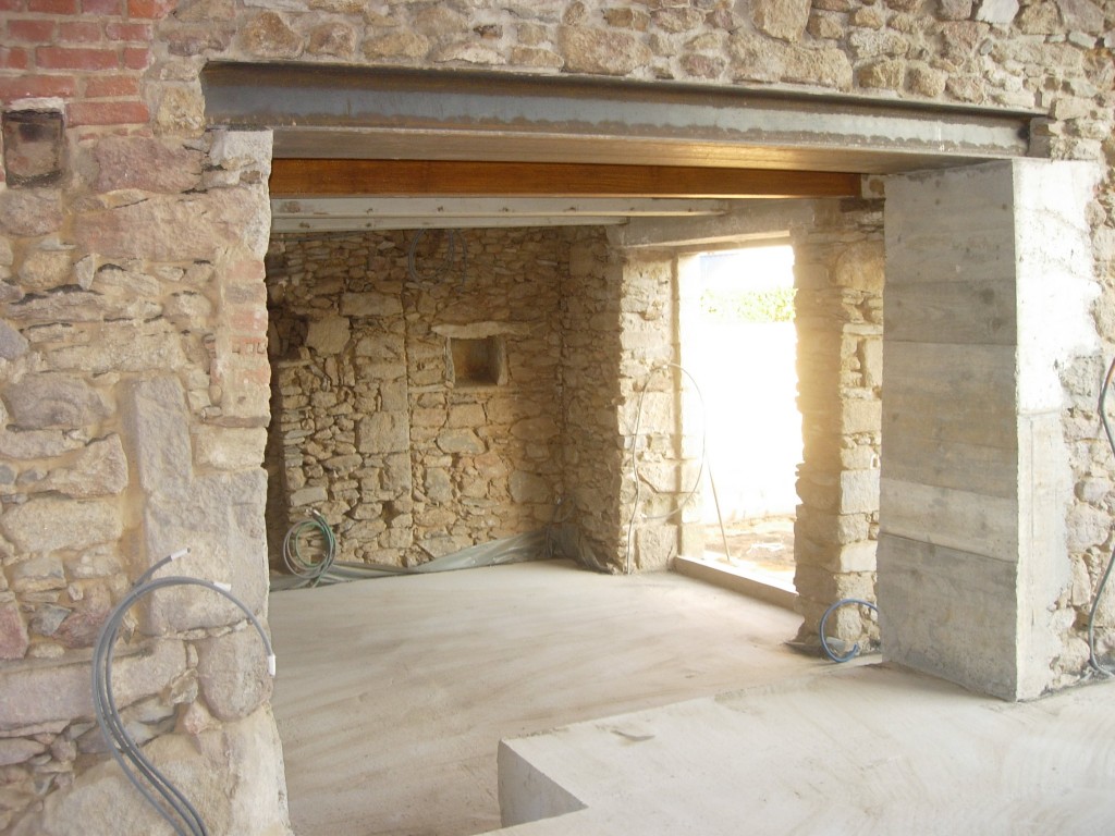 Ouverture de mur en pierre, en béton à Bourogne